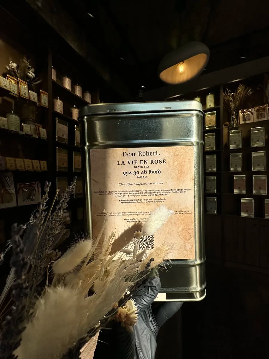 La Vie En Rose tea tin by Dear Robert against the warm shop interior